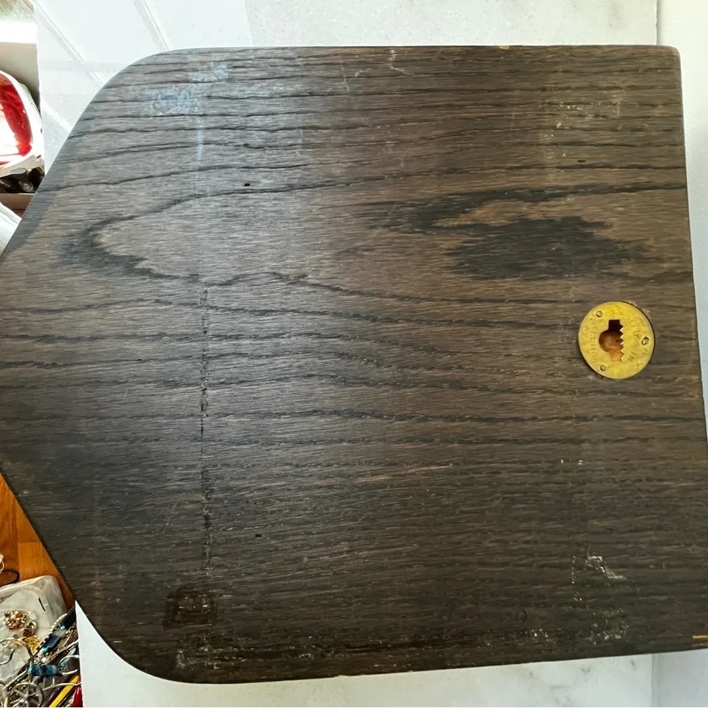 wooden plaques featuring family crests or coats of arms. McBrayer and Fllington.